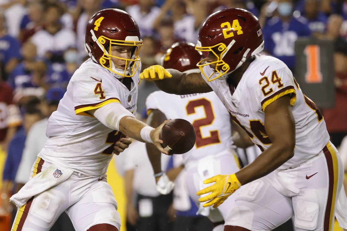 Heinicke Gibson handoff.jpg