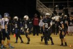 My oldest son number 60, Center, DE, DT ..D line doing work 2013 playoffs.jpg